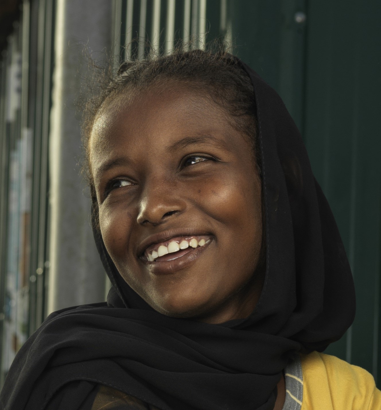 © Oxfam Frau aus Burkina Faso bei der Ernte
